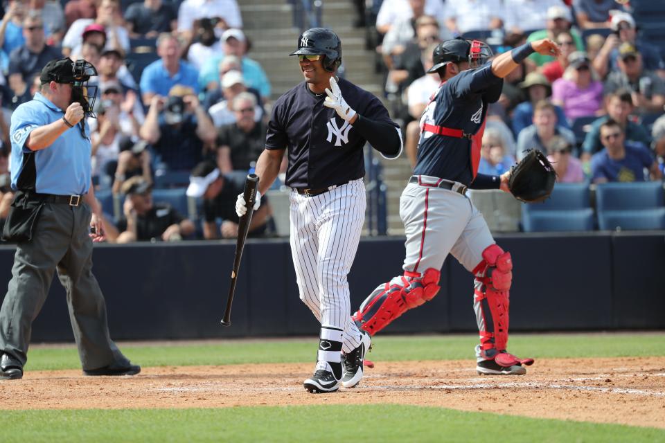 New York Yankees infielder Russell Wilson (73) smiles after striking out swinging during the fifth inning against the Atlanta Braves at George M. Steinbrenner Field.