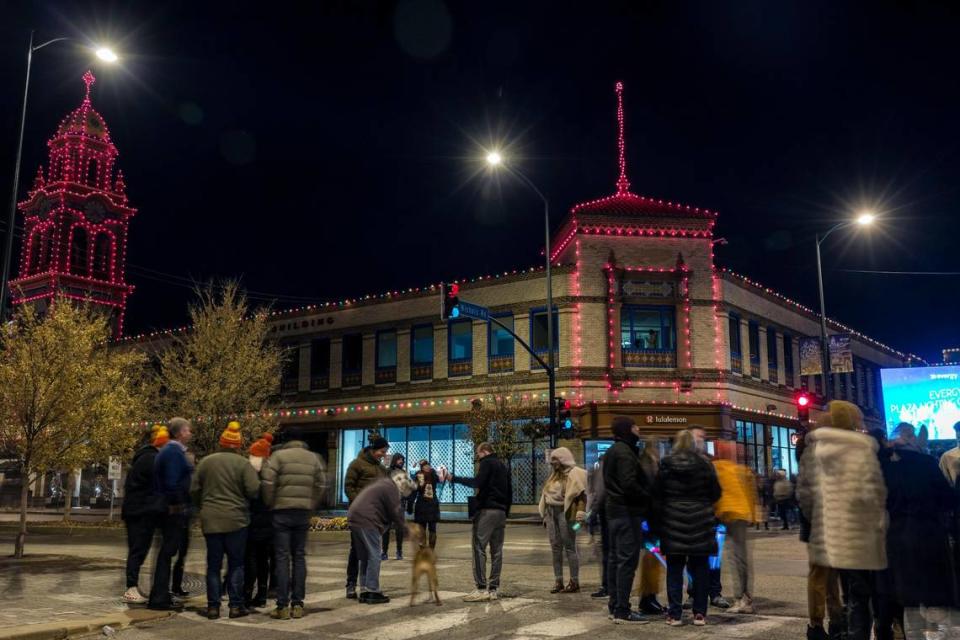 Swarms of people gather to see the annual fireworks and Christmas lighting at Country Club Plaza on Thursday, Nov. 25, 2021.