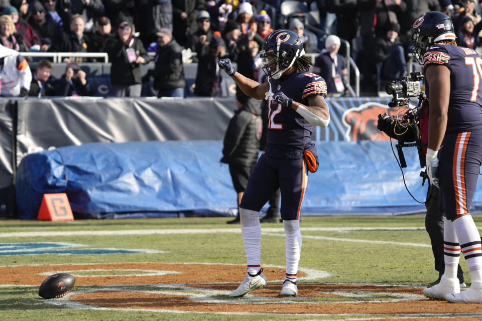 Chicago Bears wide receiver Velus Jones Jr. (12) celebrates after scoring on a 42-yard touchdown run in the first half of an NFL football game against the Minnesota Vikings, Sunday, Jan. 8, 2023, in Chicago. (AP Photo/Nam Y. Huh)