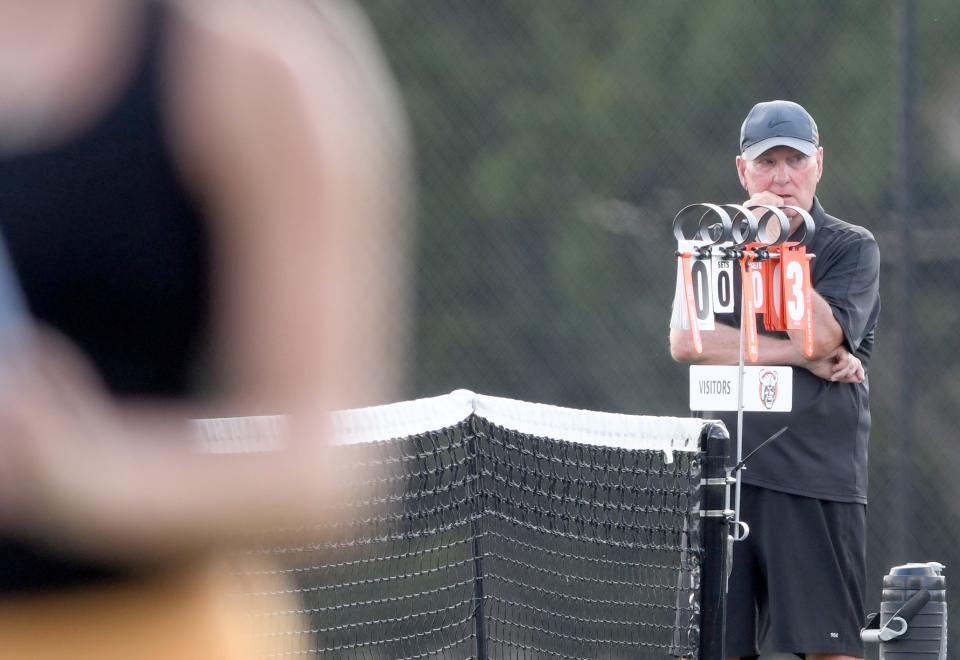 Hoover girls tennis coach Ryan Shaffer keeps his eye on play as Jackson visits Hoover. Tuesday,  Sept. 5, 2023.