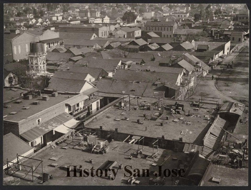 This 1887 photo provided by History San Jose, part of the History San Jose Photographic Collection, shows a view of the roof tops of Market Street in Chinatown, before an arson fire in San Jose, Calif. More than a century after arsonists burned it to the ground in 1887, the San Jose City Council on Tuesday, Sept. 28, 2021, unanimously approved a resolution to apologize to Chinese immigrants and their descendants for the role the city played in “systemic and institutional racism, xenophobia, and discrimination.” (Andrew Putnam Hill/San Jose Research Library & Archives/History San Jose via AP)