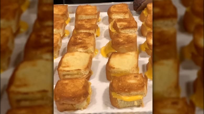Mini grilled cheeses on tray 