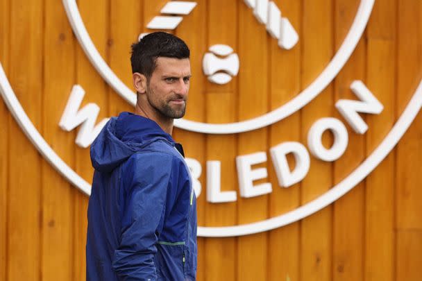PHOTO: Serbia's Novak Djokovic heads to practice at the All England Lawn Tennis and Croquet Club, London, July 7, 2022. (Matthew Childs/Reuters)