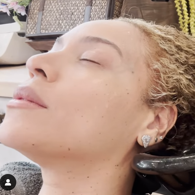 Closeup of Beyoncé getting her hair washed