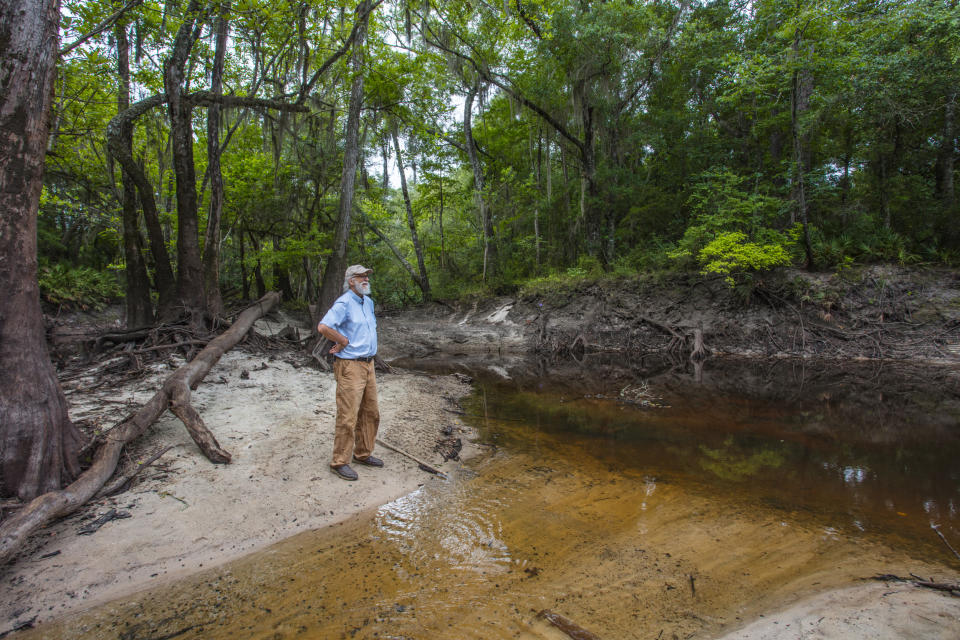 John Quarterman stands by the Withlacoochee River. (Matt Odom / for NBC News)