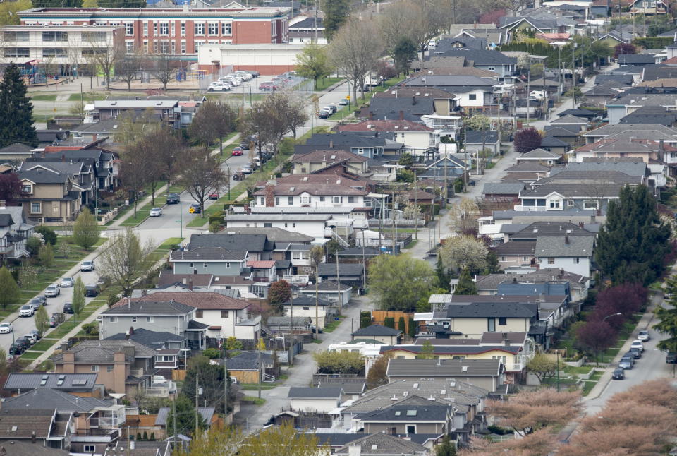 Homes are pictured in Vancouver on April 16, 2019. The Canada Mortgage and Housing Corporation is defending the mortgage stress test amid calls for the measure to be changed. President Evan Siddall says in a letter to the Standing Committee on Finance that the new measure is working as intended to lower house prices and protect Canadians from borrowing too much money. THE CANADIAN PRESS/Jonathan Hayward