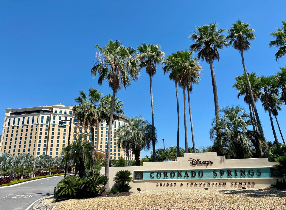 An road leads into an empty Disney Coronado Springs resort hotel after it was closed due to the COVID-19 pandemic in Kissimmee, Florida on May 5, 2020. (Photo by Daniel SLIM / AFP) (Photo by DANIEL SLIM/AFP via Getty Images)