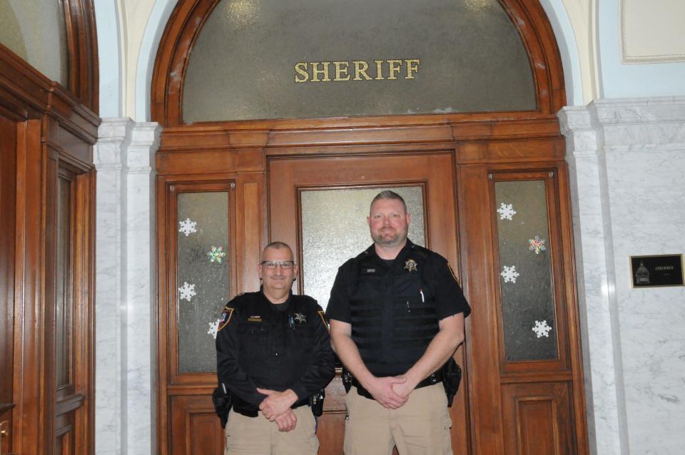 Sheriff's Deputy Alex Feoni, retired earlier in January stands with Somerset County Sheriff Dustin Weir on his last day. However, because of his experience and an increase in pay he is back.