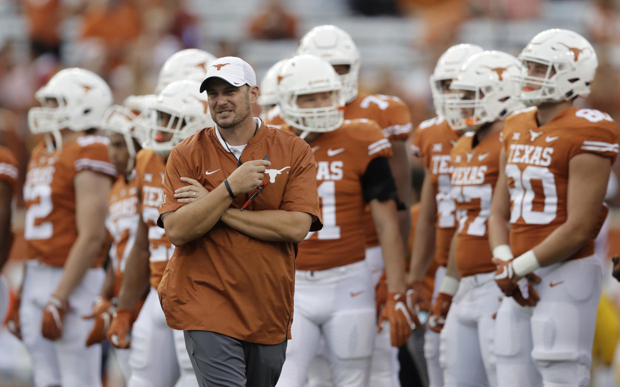 Tom Herman’s text led to a very interesting fashion choice from his wife on Saturday. (AP Photo)