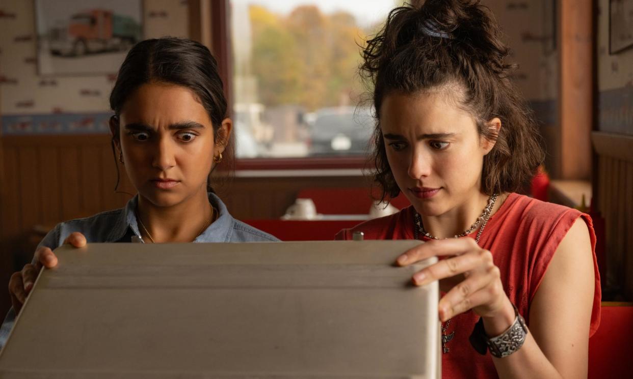 <span>Geraldine Viswanathan and Margaret Qualley in Drive-Away Dolls.</span><span>Photograph: Wilson Webb/Working Title/Focus Features</span>