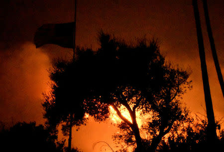 The Thomas wildfire burns in the hills outside Montecito, California, U.S., December 16, 2017. REUTERS/Gene Blevins