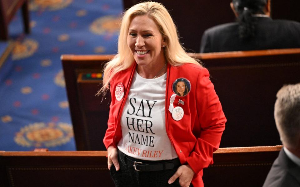 US Representative Marjorie Taylor-Greene wears a shirt and button showing slain Georgia college student Laken Riley