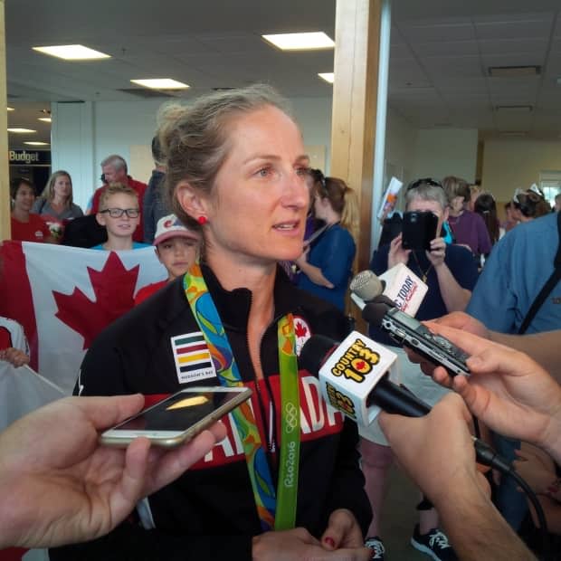 Set to compete in her fourth Olympics — her first as a mother — Catharine Pendrel, who resides in Kamloops, B.C., has closely watched Mandy Bujold and Kim Gaucher's battle with the IOC. (Tara Copeland/CBC - image credit)