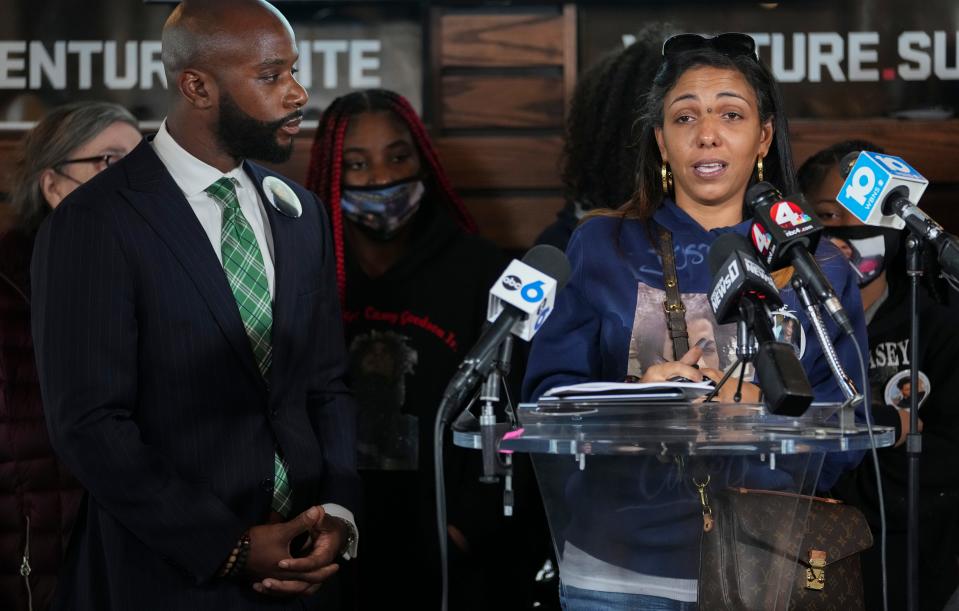 Tue., Dec. 2, 2021; Columbus, Ohio, USA; Tamala Payne, right, mother of Casey Goodson Jr., speaks during a press conference with the family attorney, Sean Walton, left, at the Huntington Empowerment Center. Walton spoke following the indictment of former Franklin County Sheriff's Deputy Jason Meade on murder charges stemming from the 2020 police shooting death of Goodson.