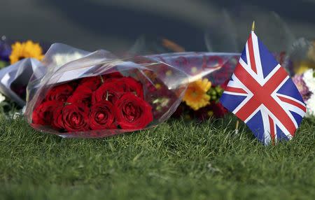 Tributes are seen in Parliament Square following a recent attack in Westminster, London, Britain March 24, 2017. REUTERS/Neil Hall