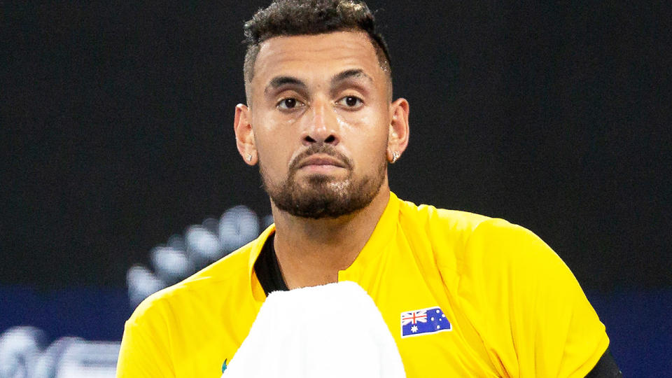 Nick Kyrgios, pictured here looking dejected during his loss at the ATP Cup.