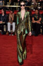 <p>Model wears a green metallic pantsuit at the fall 2018 Christian Siriano show. (Photo: Getty Images) </p>