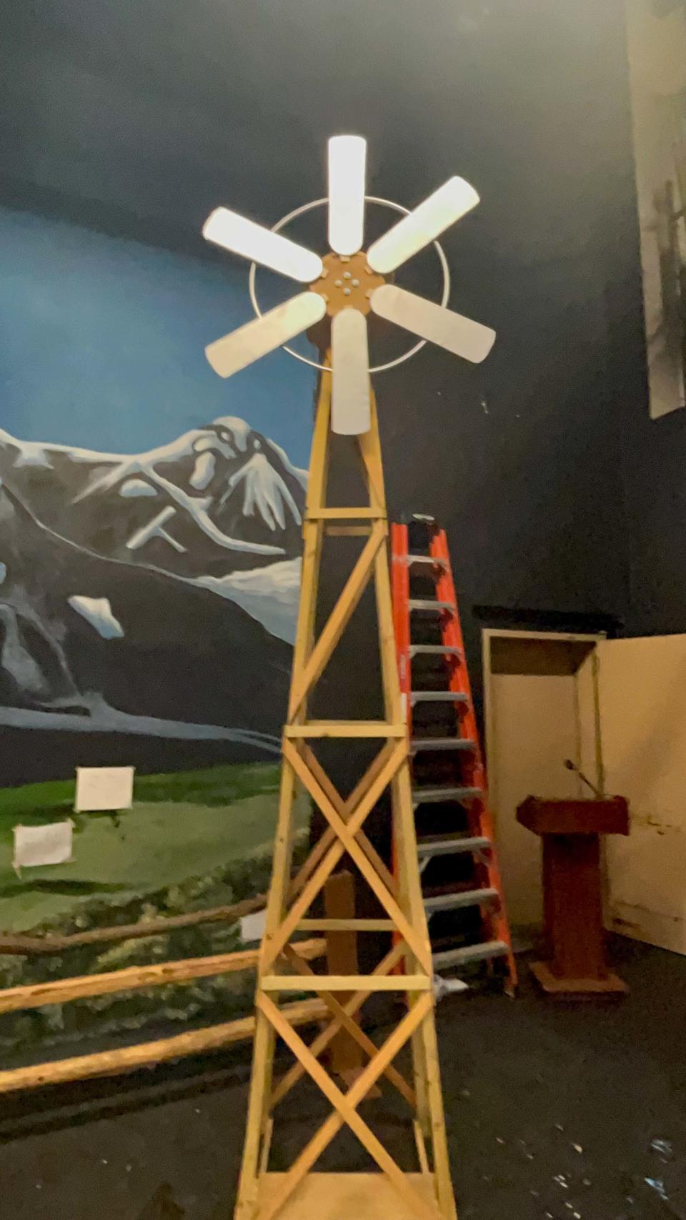 The musical theater kids are setting the stage for “Oklahoma!” with good old-fashioned elbow grease. The props are made by the kids at Byington Solway, the Art Department and by Seth Tinsley and friends. The windmill is borrowed from another school but had to be repaired at Karns High School. March 8, 2023.