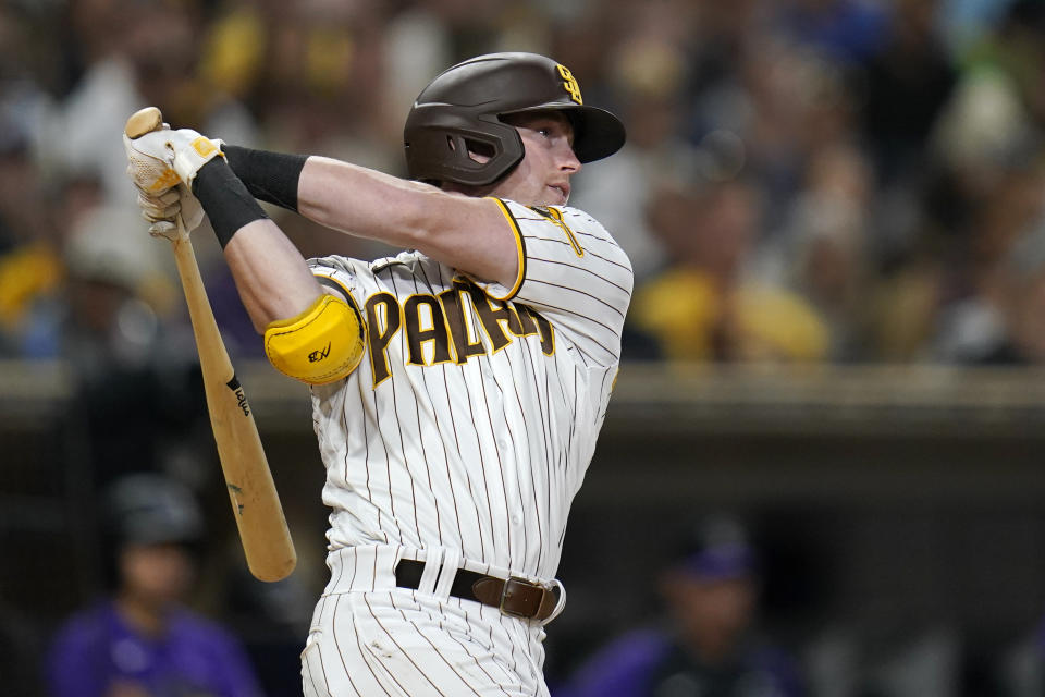 San Diego Padres' Jake Cronenworth watches his two-run double during the fourth inning of the team's baseball game against the Colorado Rockies, Friday, June 10, 2022, in San Diego. (AP Photo/Gregory Bull)