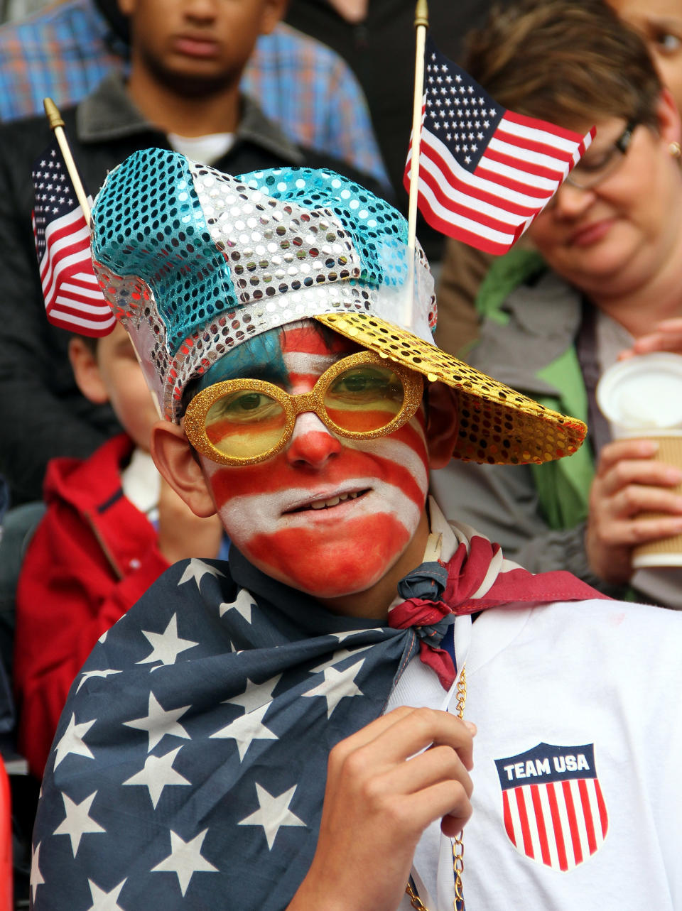 MANCHESTER, ENGLAND - JULY 31: United States fans enjoy the atmosphere during the Women's Football first round Group G match between the United States and DPR Korea,on Day 4 of the London 2012 Olympic Games at Old Trafford on July 31, 2012 in Manchester, England. (Photo by Stanley Chou/Getty Images)