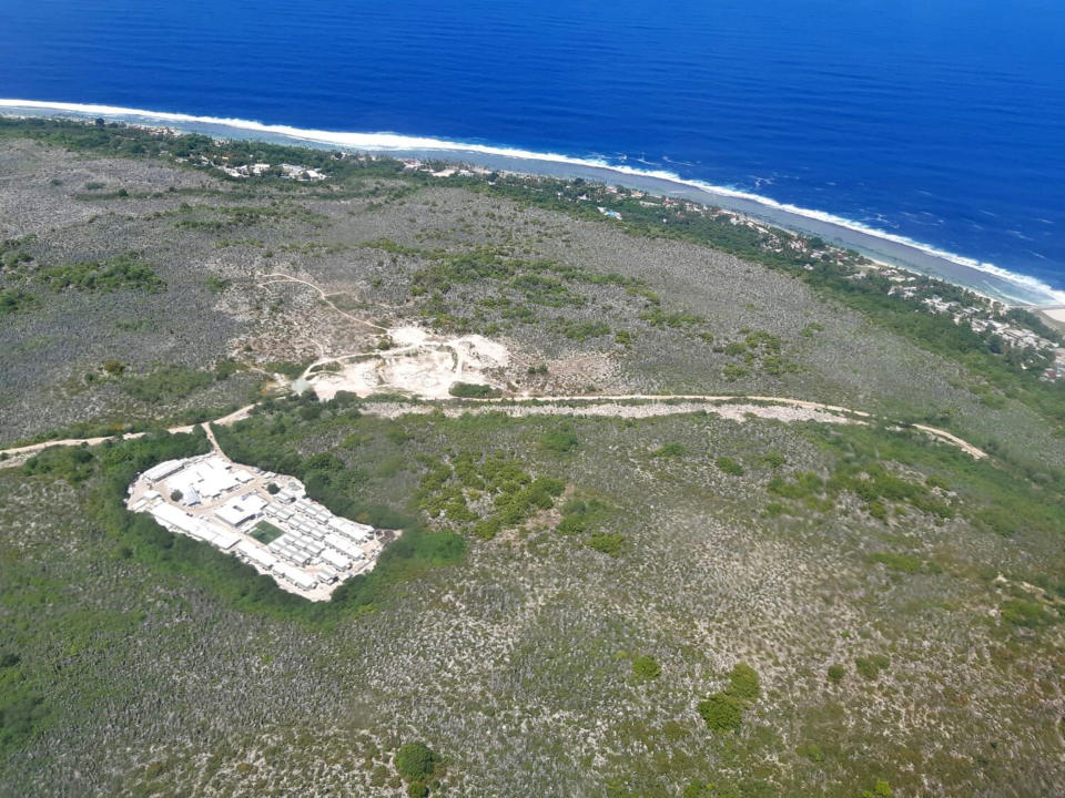 This October 2018, aerial photo provided by Medecins Sans Frontieres shows the island of Nauru. Humanitarian medical professionals expelled from Nauru said on Thursday, Oct. 11, 2018, asylum seekers that Australia had banished to the tiny Pacific atoll were suicidal and their children have lost hope. The Nauru government forced Doctors Without Borders out of the country last week, abruptly ending their free medical care for asylum seekers refugees and local Nauruans. (Medecins Sans Frontieres via AP)