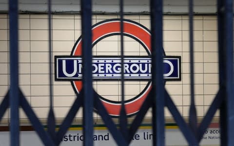 File photo dated 05/08/15 of a London Underground sign seen through locked gates. Drivers on London Underground have launched a 24-hour strike in a dispute over the "forced displacement" of staff, which will cause disruption to Tube services. PRESS ASSOCIATION Photo. Issue date: Wednesday January 25, 2017. See PA story INDUSTRY Tube. - Credit: Anthony Devlin/PA Wire