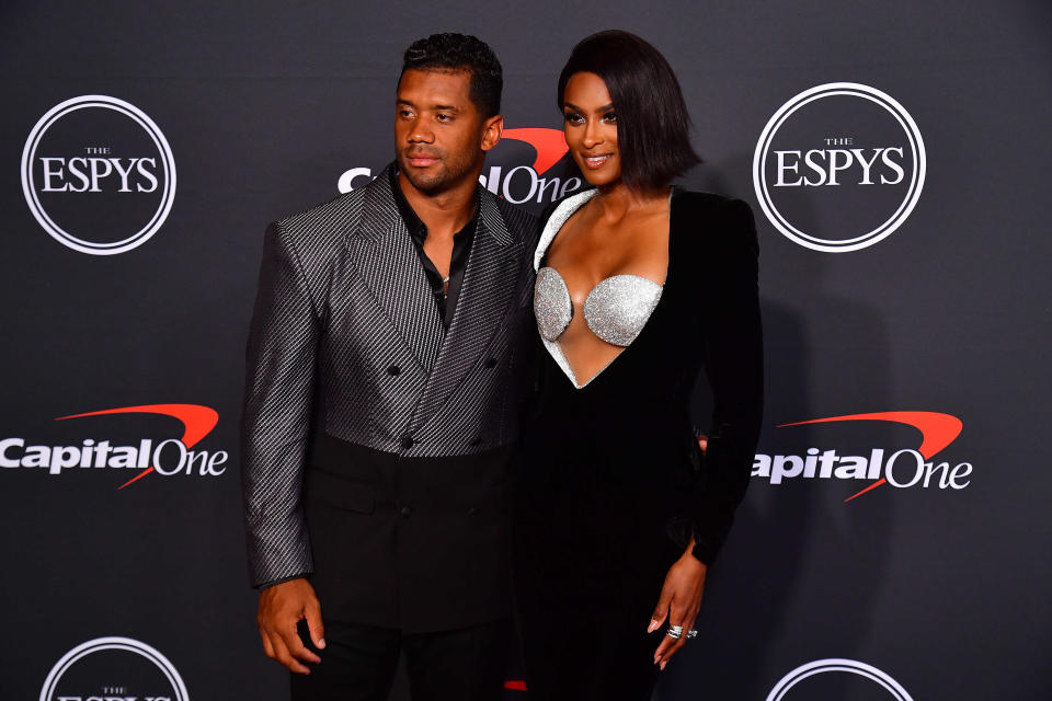 Denver Broncos quarterback Russell Wilson and his wife, recording artist Ciara, arrive at the 2022 ESPY awards in Los Angeles.