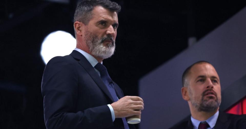 Roy Keane holds a coffee Credit: Alamy