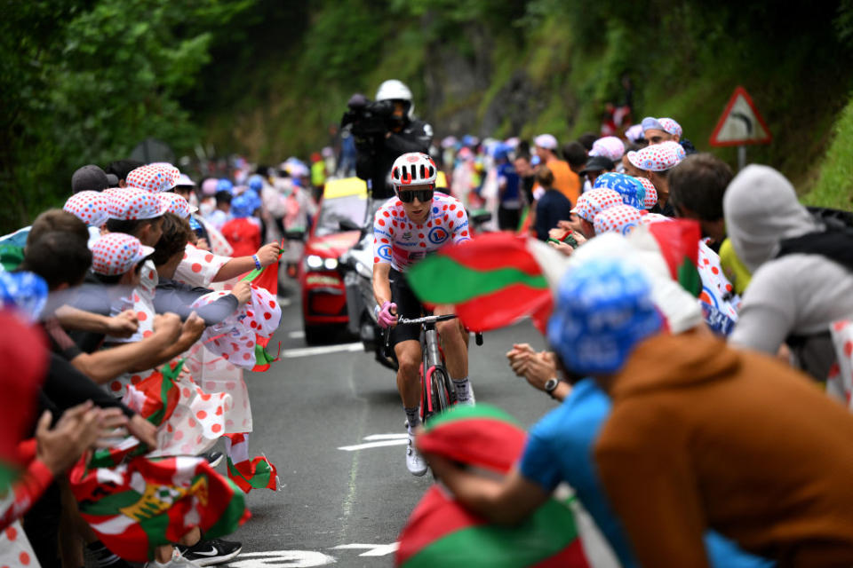 SAN SBASTIN SPAIN  JULY 02 Neilson Powless of The United States and Team EF EducationEasyPost competes in the breakaway at the Cote dAlkiza 365m while fans cheer during the stage two of the 110th Tour de France 2023 a 2089km stage from VitoriaGasteiz to San Sbastin  UCIWT  on July 02 2023 in San Sbastin Spain Photo by David RamosGetty Images