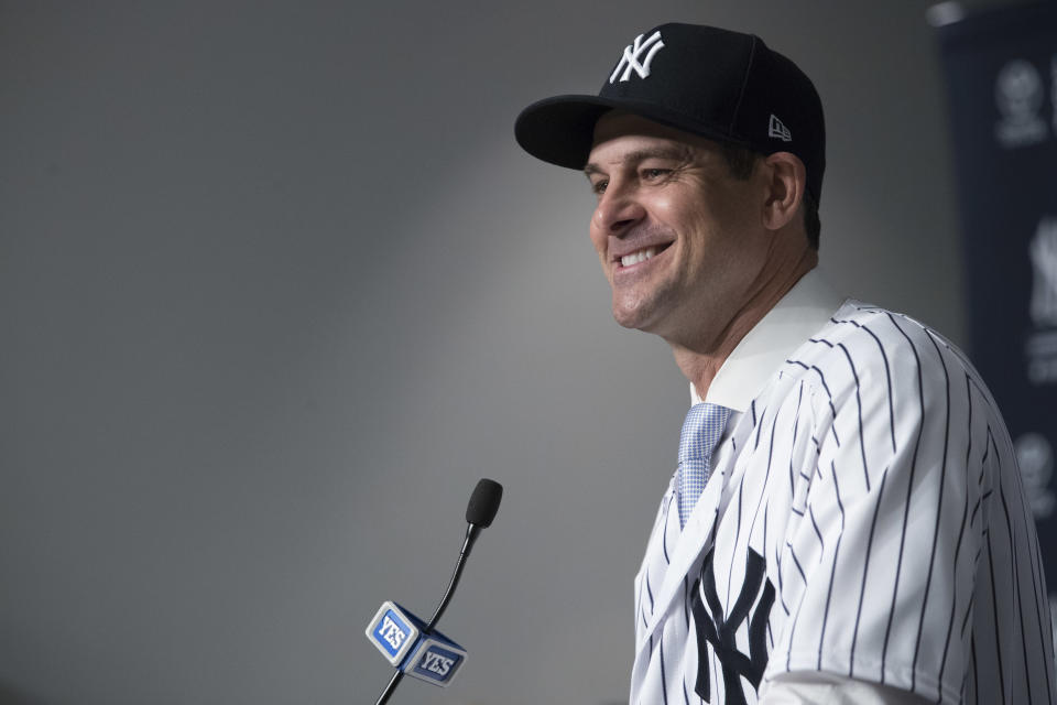 Aaron Boone cracked some jokes with the media at his first press conference as Yankees manager. (AP Photo/Mary Altaffer)