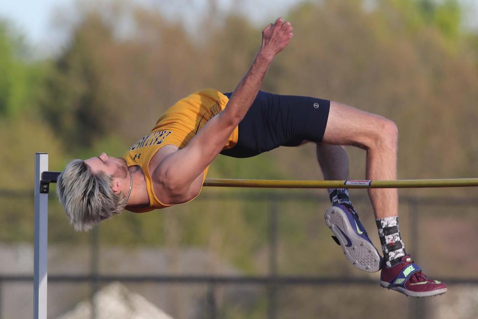 Riley Murphy of Tallmadge jumps to a first place finish in the high jump at the Suburban League American Conference Track and Field Meet at Tallmadge High School in May.