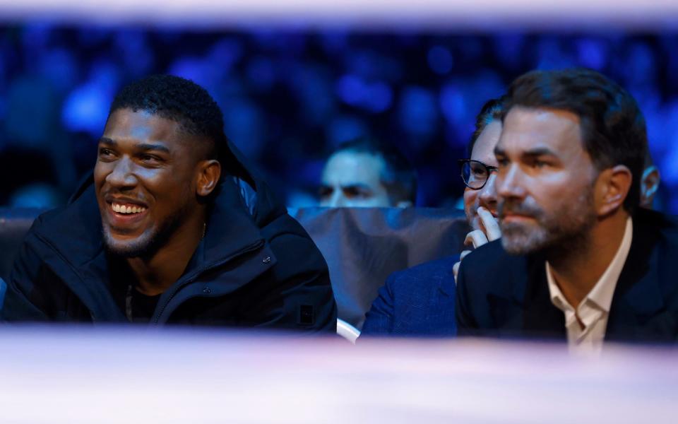 Anthony Joshua (left) and Eddie Hearn - Dillian Whyte beats Jermaine Franklin to set up potential Anthony Joshua rematch - Steven Paston/PA