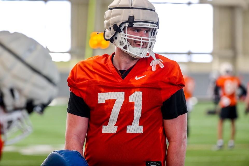 Dalton Cooper goes through drills during an Oklahoma State practice on March 21 at Sherman E. Smith Training Center in Stillwater.