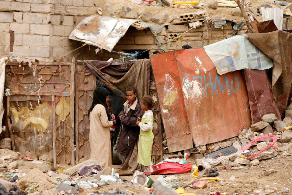 <p>Children displaced from the Red Sea port city of Hodeidah stand outside their shelter in Sanaa, Yemen July 18, 2018. (Photo: Khaled Abdullah/Reuters) </p>