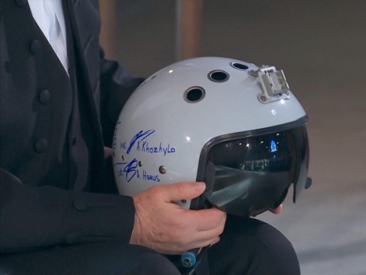 Helmet presented to British speaker (Reuters)