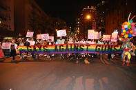 <p>Gays Against Guns carry a banner while marching in the 44th annual Village Halloween Parade in New York City on Oct. 31, 2017. (Photo: Gordon Donovan/Yahoo News) </p>