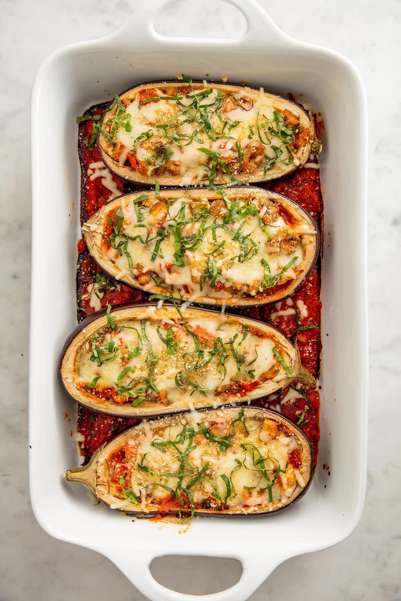 <p>You won't miss the pasta.</p><p>Get the <a href="https://www.delish.com/uk/cooking/recipes/a28960601/stuffed-eggplant-parm-recipe/" rel="nofollow noopener" target="_blank" data-ylk="slk:Stuffed Aubergine Parm;elm:context_link;itc:0;sec:content-canvas" class="link ">Stuffed Aubergine Parm</a> recipe.</p>