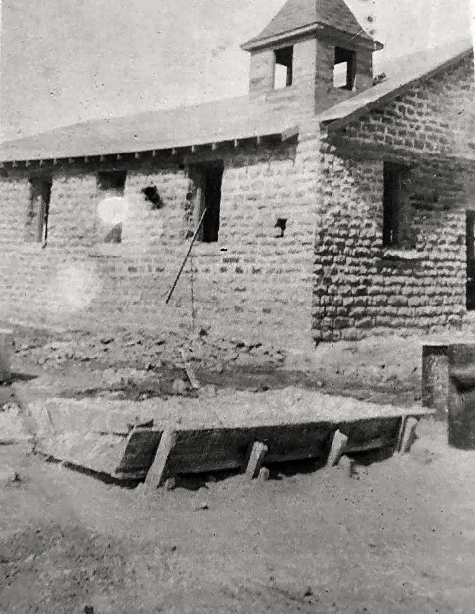 This early day photo shows St. Thomas Primitive Baptist Church under construction.