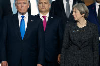 <p>President Donald Trump stands with British Prime Minister Theresa May during a group photo with NATO leaders at the new NATO headquarters, Thursday, May 25, 2017, in Brussels. (AP Photo/Evan Vucci) </p>