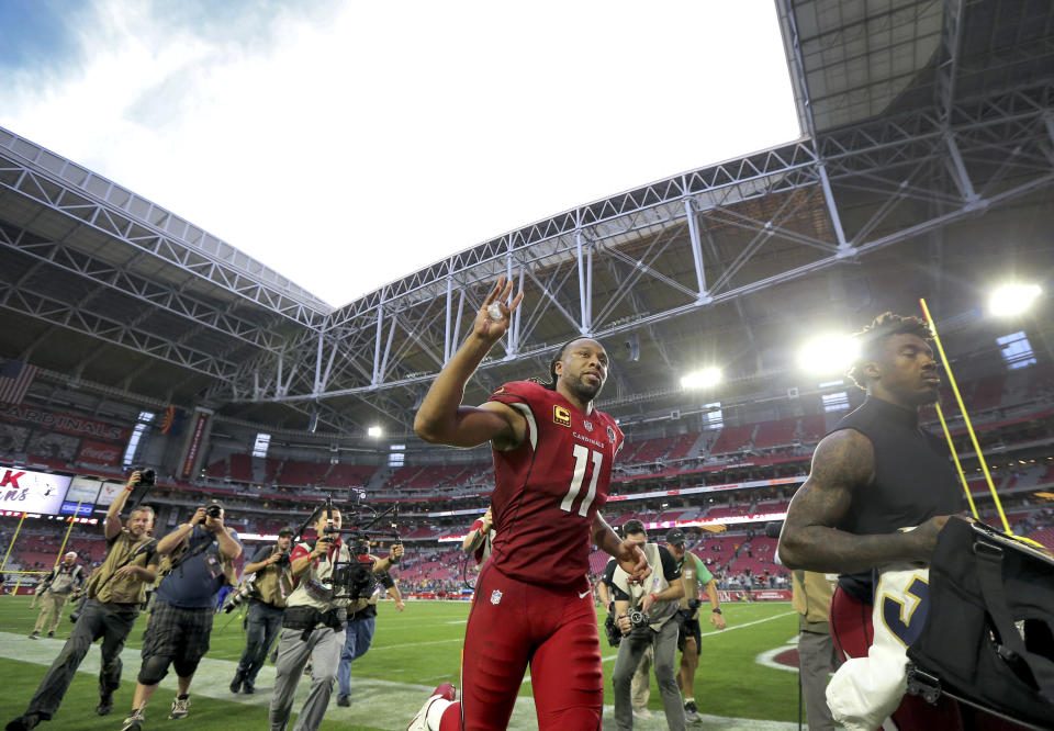 Larry Fitzgerald has signed a one-year deal to play a 16th season with the Arizona Cardinals. (AP)