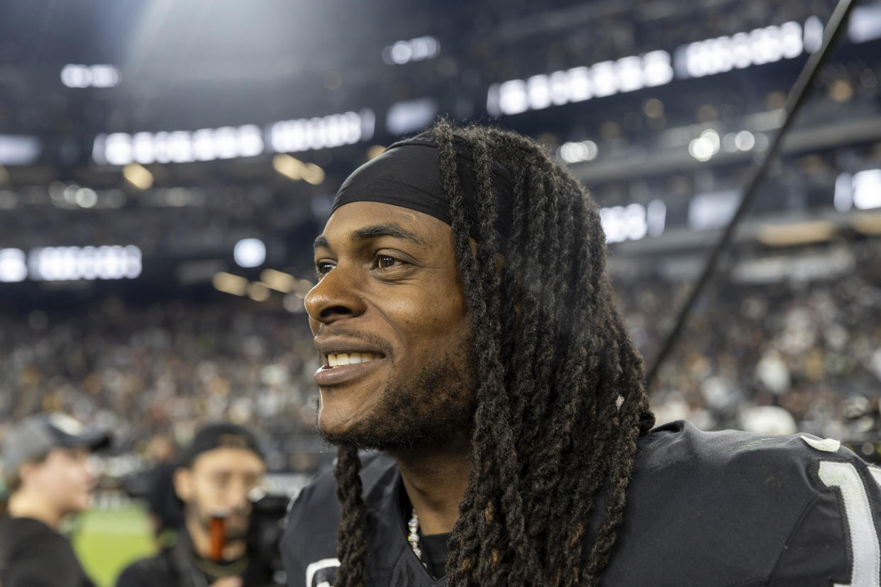Las Vegas Raiders wide receiver Davante Adams (17) smiles after the Raiders defeat the Green Bay Packers 17-13 in an NFL football game, Monday, Oct. 9, 2023, in Las Vegas, NV. (AP Photo/Jeff Lewis)