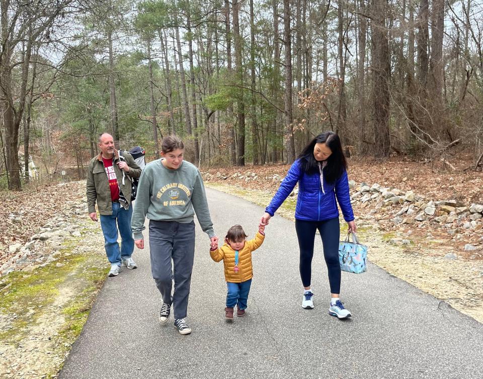 From left to right, my father-in law, two sisters-in-law and stepmother-in-law, walking on the Cape Fear River Trail, Feb. 11.