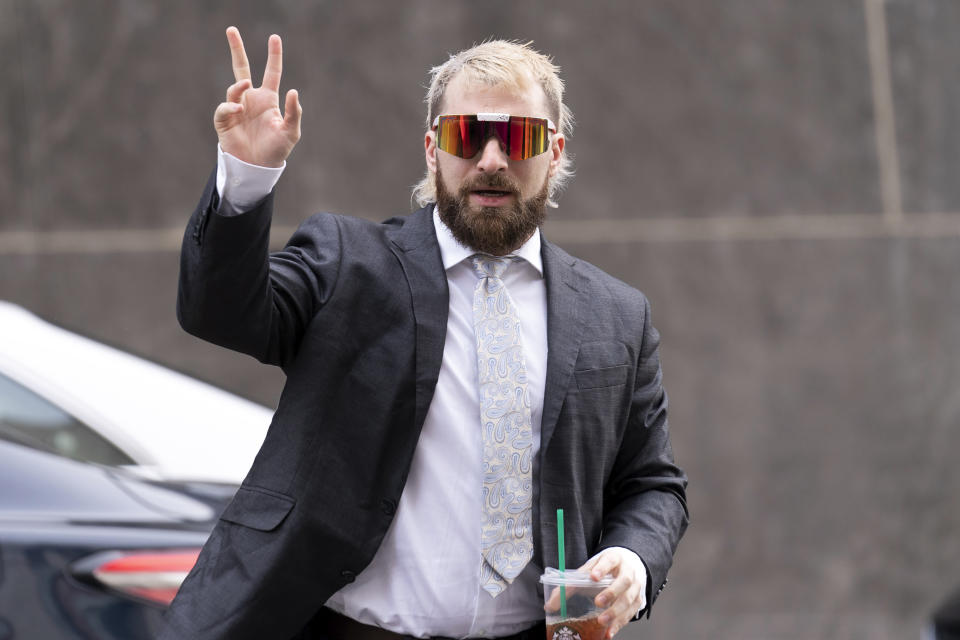 Anthime "Baked Alaska" Gionet, who livestreamed himself storming the U.S. Capitol in Jan. 6, arrives at federal court in Washington, Tuesday, Jan. 10, 2023. (AP Photo/Jose Luis Magana)