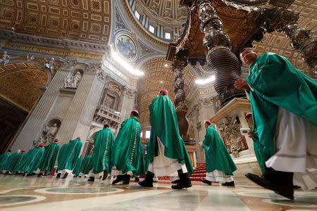 Cardinals and bishops leave at the end of the Holy Mass for the Pilgrimage to the Tomb of St. Peter lead by Pope Francis at the Vatican, October 25, 2018. REUTERS/Alessandro Bianchi