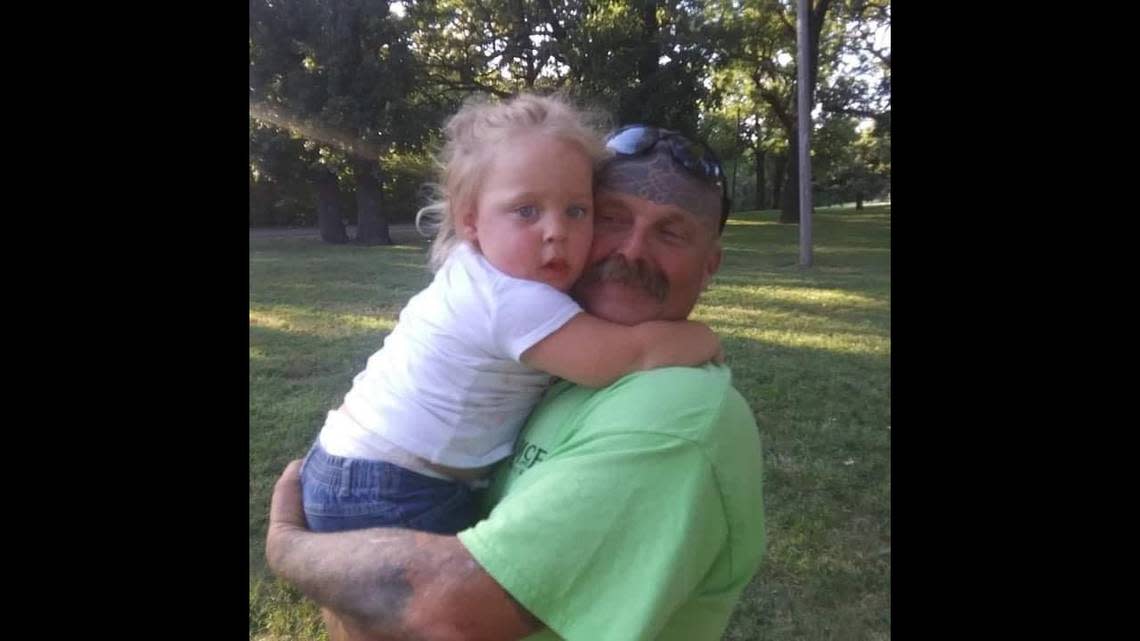 John Anderton, 50, shown here with his daughter, was shot and killed by Kansas City, Kansas, police. Justice for Wyandotte said he was unarmed during the Feb. 3, 2023 encounter.