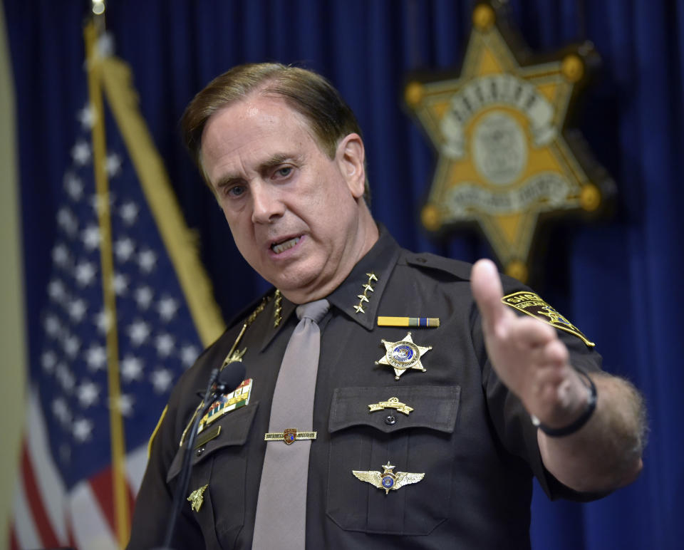 Oakland County Sheriff Michael Bouchard speaks at a news conference, Thursday, July 2, 2020, in Pontiac, Mich., to confirm one felonious assault charge each has been filed against Eric and Jillian Wuestenberg, both of Independence Township, after a confrontation that resulted in pointing hand guns at Takelia Hill and her children after exiting a restaurant in Orion Township, a day earlier. (Todd McInturf/Detroit News via AP)