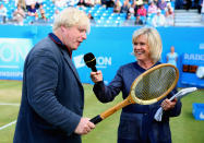 LONDON, ENGLAND - JUNE 16: London Mayor Boris Johnson speaks to Sue Barker ahead of the Rally Against Cancer charity match on day seven of the AEGON Championships at Queens Club on June 16, 2013 in London, England. (Photo by Julian Finney/Getty Images)