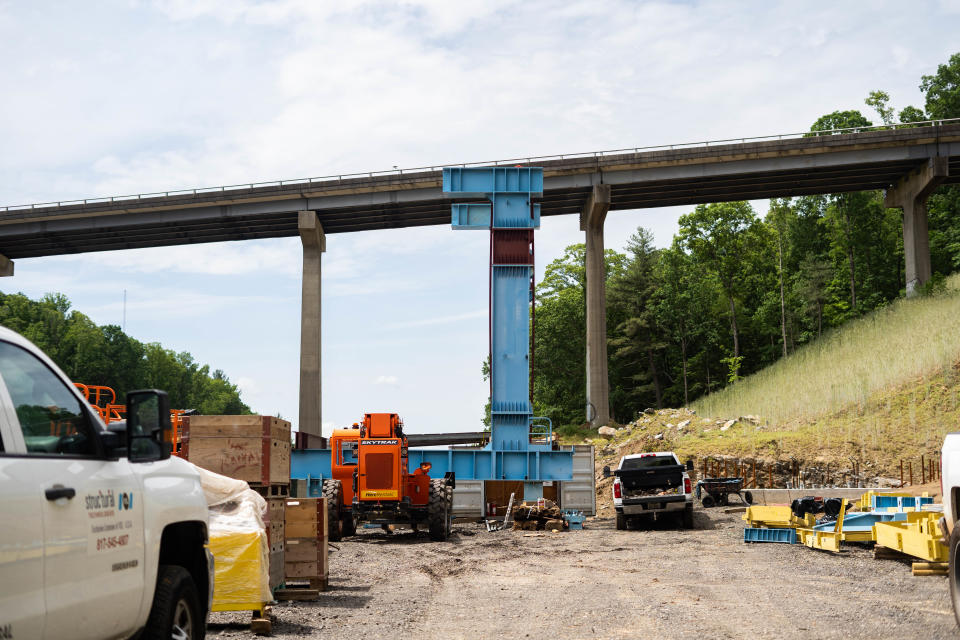 Motorists will notice a large blue tower going up just south of the existing Blue Ridge Parkway bridge. The structure is a lift tower for segments of the new bridge that will start going up in June. When the new bridge is completed, the old bridge will be demolished.