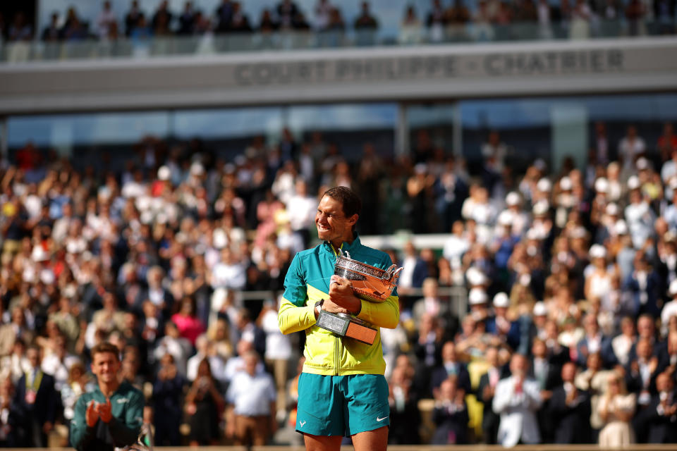 Rafa Nadal celebrates with the French Open trophy.