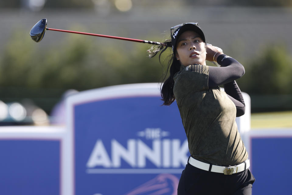 Patty Tavatanakit watches her tee shot on the ninth hole during the first round of an LPGA golf tournament Thursday, Nov. 9, 2023, in Belleair, Fla. (AP Photo/Scott Audette)